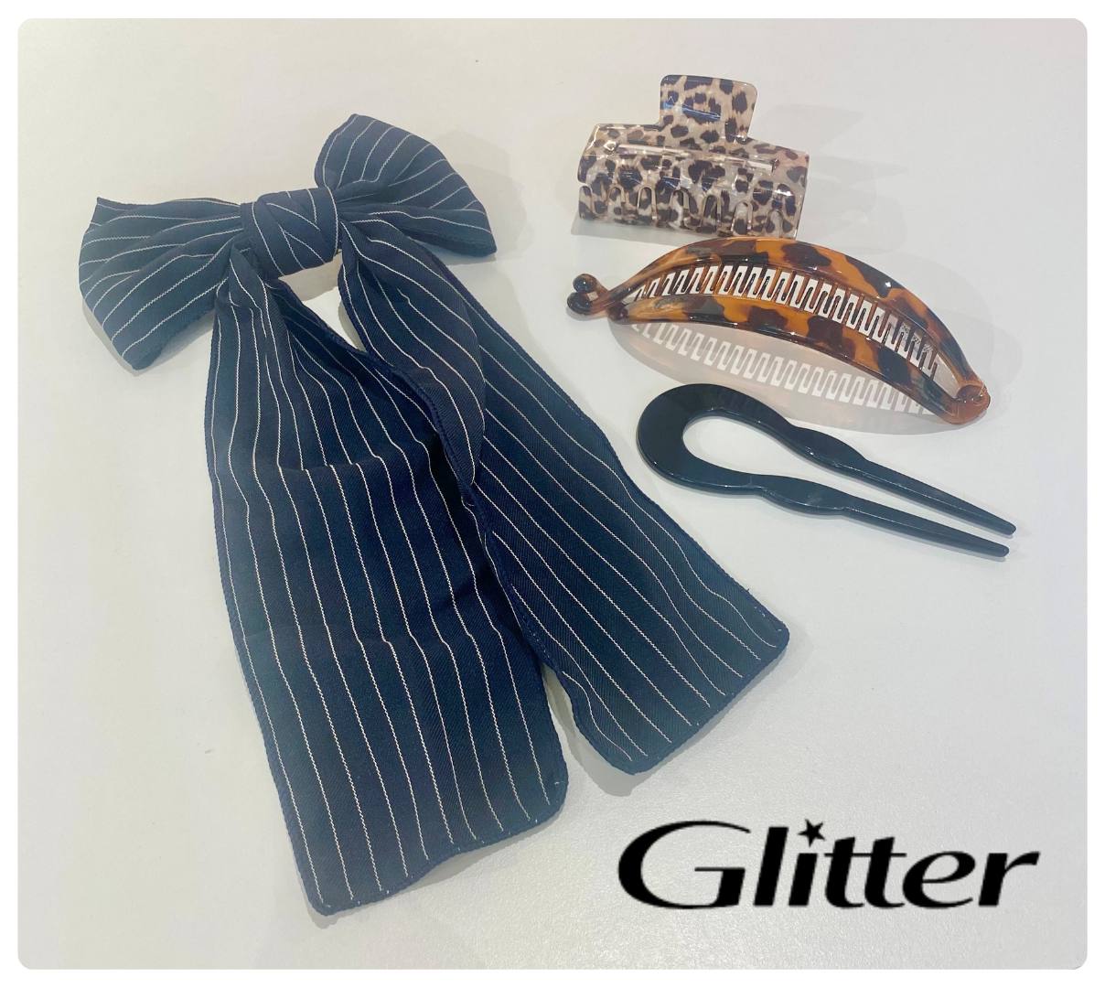Hårklemmer og -spænder kan købes hos Glitter
